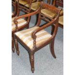 A set of seven (6+1) mahogany dining chairs in the manner of Gillows, circa 1810, with recovered