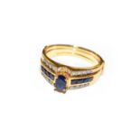 A sapphire and diamond ring, stamped ‘750’, finger size N1/2