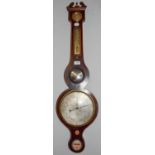 A string inlaid mahogany wheel barometer with silvered dial