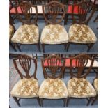 A set of six mahogany shield back dining chairs