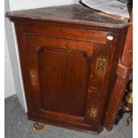 A George III oak panelled hanging corner cupboard, 74cm by 44cm by 94cm, together with a George