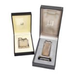 Two Dunhill table lighters, each white metal and with boxes (2)