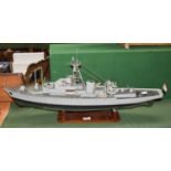 A modern scratch built model of a WWII Royal Navy cruiser, painted in arctic grey