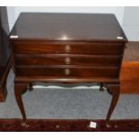 A mahogany three drawer canteen table containing a Kings pattern service of plated flatwareCondition