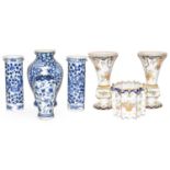 Four 19th century Chinese blue and white vases, including a pair of sleeve vases each painted with a