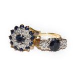 A sapphire and diamond cluster ring, stamped '18CT', finger size K; and an 18 carat gold sapphire