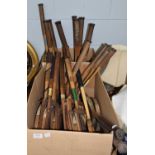 A group of vintage wooden tennis rackets including Slazenger, Altas Co., Leader, H.J. Gray & Sons