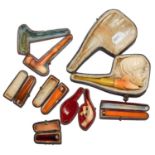 A collection of pipes, four gold-mounted cheroot holders, including a Meersham example. (7)