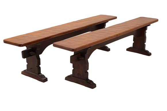 Robert Mouseman Thompson (1876-1955): A Pair of 6ft Oak Benches, on three shaped supports, joined by