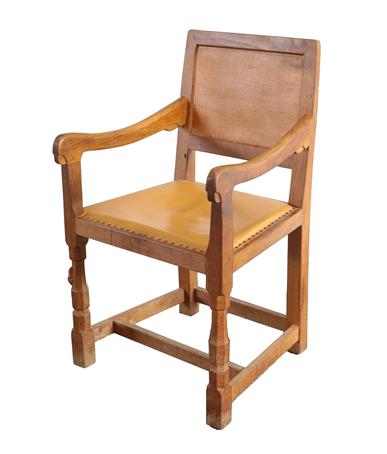 Workshop of Robert Mouseman Thompson (Kilburn): An English Oak Panel-Back Armchair, on octagonal