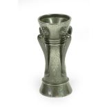 A Liberty & Co: A Tudric Pewter Vase, model No.01214, with four handles, hand beaten, stamped 4