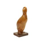 A Carved Figure Standing Duck, by Brenda Thurkle, 1954, sycamore, labelled WAKEFIELD CITY ART