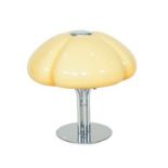 A Harvey Guzzini Quadrifoglio Table Lamp, designed in 1968, polished chrome circular base and four