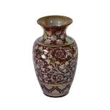 A Pilkington's Royal Lancastrian Lustre Vase, decorated by William S Mycock, with repeating foliage,