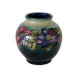 Walter Moorcroft (1917-2002): A Large Clematis Pattern Vase, on a green/blue ground, blue painted