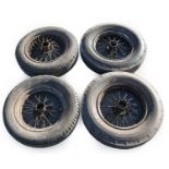 A Set of Four 16" Wire Wheels, with rubber tyres (a.f.)Condition report: Four wire wheels, 1 MG