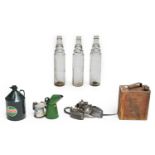 Three Esso Lube Clear Glass Oil Bottles, 38cm high; Two Metal Oil Jugs; A Painted Castrol Oil