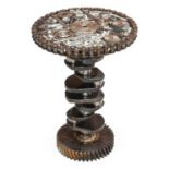 Steampunk: A Bespoke Circular Pedestal Table, the top made from assorted spanners, sprocket set