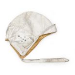 A Vintage White Leather Driver's Helmet, with double stitched seams, soft peak, rolled ear flaps and