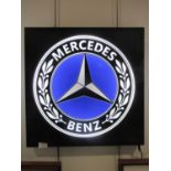 A Reproduction Illuminated Mercedes-Benz sign, 50cm by 49.5cm with power adapter
