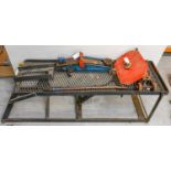 An Adjustable Hydraulic Metal Bike Ramp; and Two Trolley Jacks (3)