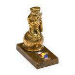 A Solid Brass Golfer Car Radiator Mascot, mounted on a rectangular base with enamelled Dunlop