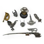 Eight Associated 1920/30 Car Mascots, to include, Wolseley, Morris, Alvis; and A Small Brass Horn (
