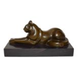 A French Bords du Seine bronze Art Deco style figure of a big cat on a black marble plinth