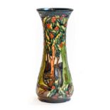 A modern Moorcroft waisted vase decorated with a landscape incorporating Holly trees, 30.5cm