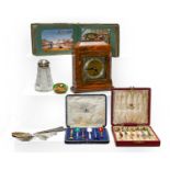 An Elliot mantel timepiece in a burr walnut case, together with a postcard album and contents, a