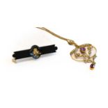 An Edwardian amethyst and split pearl pendant on chain; a split pearl brooch, stamped '9CT',