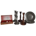 An 18th century oak candle box; together with a pair of pewter plates with touch marks, pair of