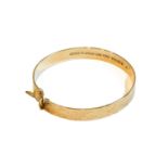 A 9 carat gold bangle, inner measurements 5.7cm by 5.5cmCondition report: Gross weight 15.6 grams.