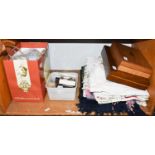 A collection of assorted items including various textile and sewing accessories, thimbles,