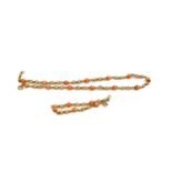 A coral and cultured pearl necklace, length 41cm; and a matching bracelet, length 17.5cmCondition