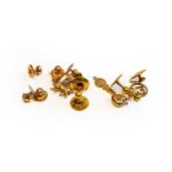 Eight dress studs stamped '9CT'; a 9 carat gold dress stud; a 15 carat gold dress stud; and an