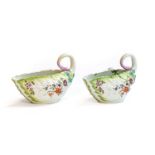 A pair of Derby porcelain leaf moulded sauceboats, circa 1750, painted with flowersprays and