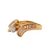 A 9 carat gold diamond solitaire ring, the round brilliant cut diamond in a white claw setting, to