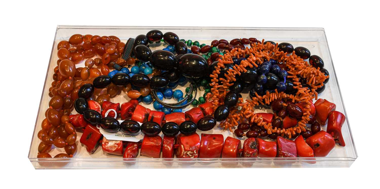 A collection of bead necklaces, including a coral branch necklace, cornelian, lapis lazuli,