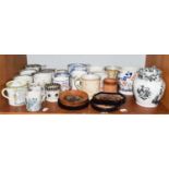 A collection of mostly early 19th century Staffordshire pottery, mainly printed mugs, to include