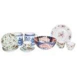 A quantity of mainly Chinese porcelain including a Qianlong famille rose plate, a pair of early 19th