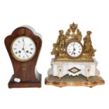 A 19th century striking mantel clock in mahogany and brass inlaid balloon case, with enamel dial,