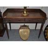 A 19th-century mahogany washstand in the manner of Gillows, on tapering reeded legs, moving on