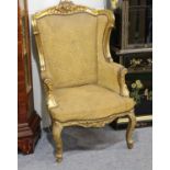 A Pair of Louis XV style giltwood armchairs