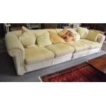 Two cream upholstered Duresta sofas, a four-seater 322cm long and a three-seater 237cm long