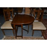 A set of four oak dining chairs, two 1920s oak trolleys, two pairs of white painted bedside