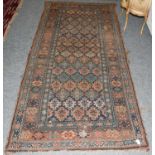 Tekke rug, the field with three columns of guls enclosed by hooked gul borders, 205cm by 149cm,