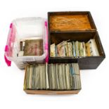 A Plastic Storage tub with a pink lid and a Black Box containing a varied collection of postcards