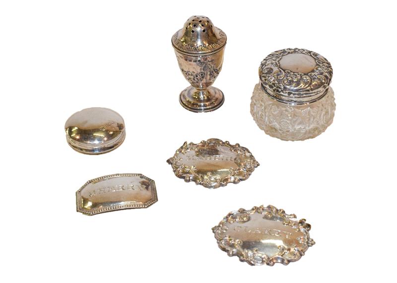 A collection of silver and silver plate, the silver comprising a silver pill box, a silver mounted