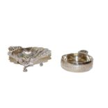 An Elizabeth II silver wine taster and a shell shaped dish (2)